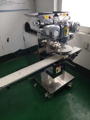 Macchina per incrustare automaticamente con funzione di riempimento dei biscotti