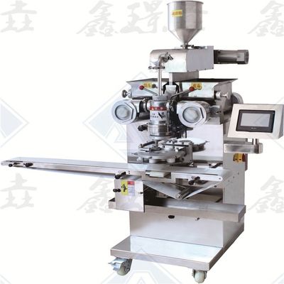 Macchina automatica per la formazione di rotoli di biscotti per prodotti a forma perfetta