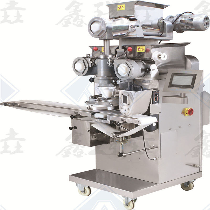 390 kg Macchina automatica di incrustazione e produzione di Kubba/Kibbeh con una capacità di lavoro di 20-135 pezzi/min